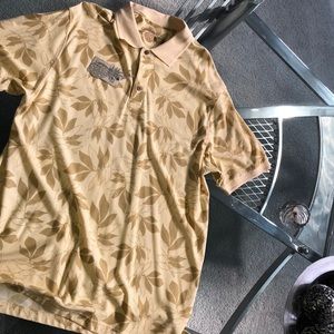 Caribbean polo. Yellow leafy design. Silk blend